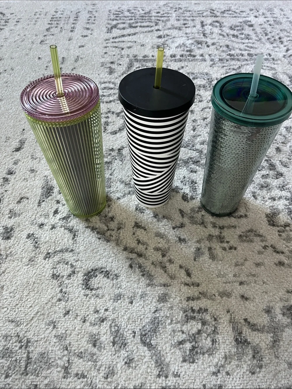 Three Starbucks 24 oz venti cold tumblers.